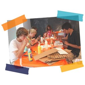 Teenagers work on art projects