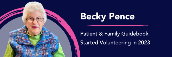Becky Pence, a volunteer assembles Patient and Family guidebooks
